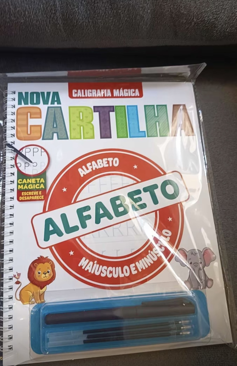 Cartilha com caneta mágica e recargas — foto de cliente